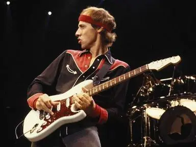 Mark Knopfler guitarrista y líder de Dire Straits